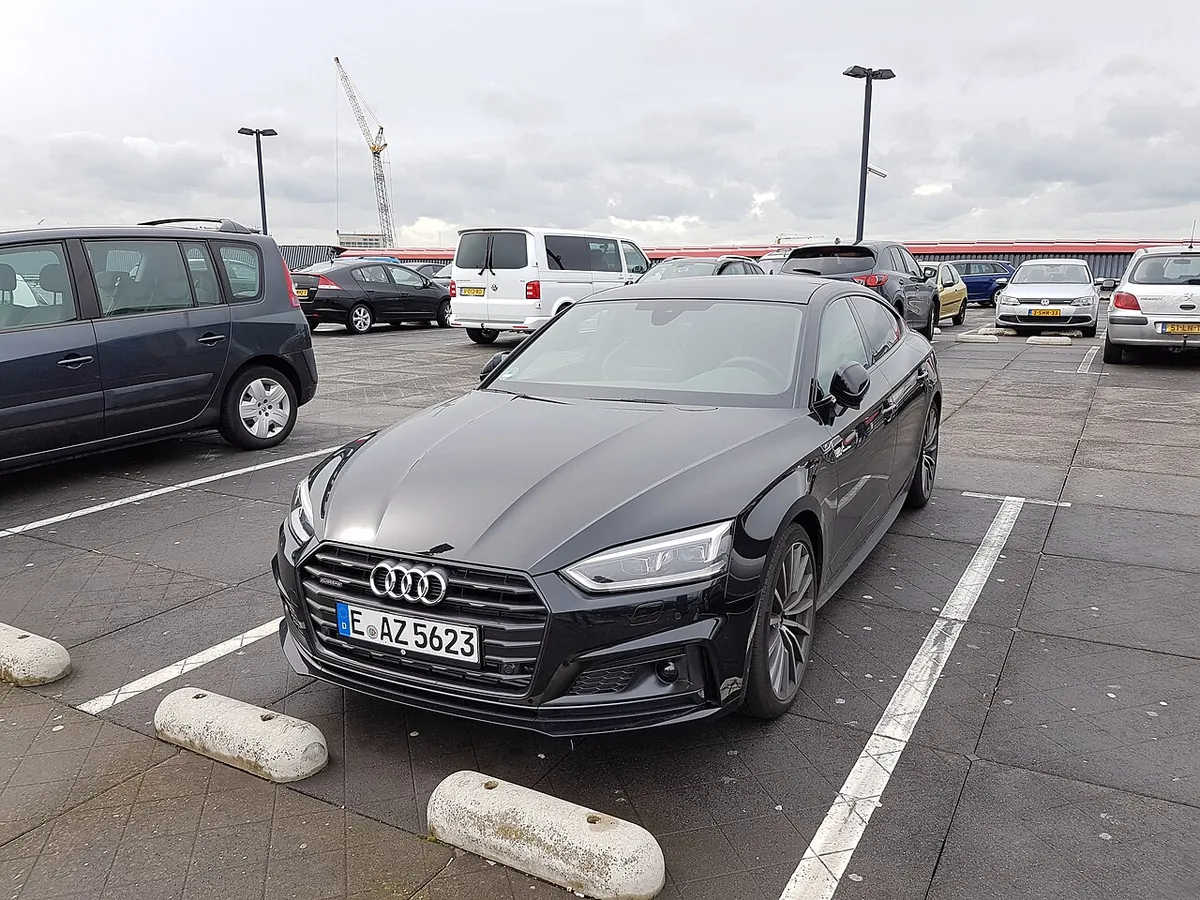 Grey Audi A5 F5 Sportback viewed from the front and side