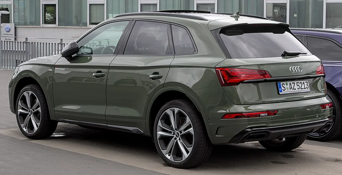 Green Audi Q5 FY facelift SUV viewed from the rear and side