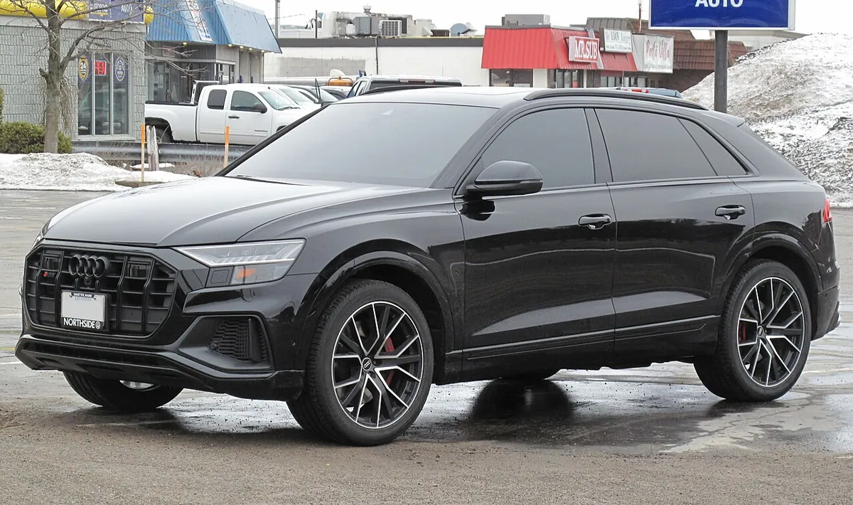 Black 2021 Audi SQ8 TFSI viewed from the front and side