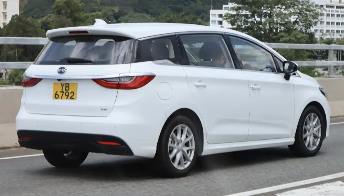White second-generation BYD e6 electric MPV seen from the rear and side in Hong Kong