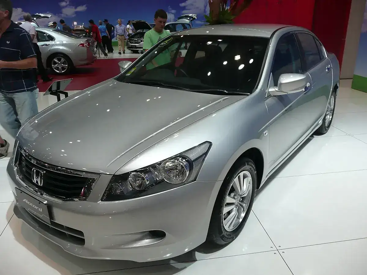 Silver 2008 Honda Accord sedan viewed from the front and side at a Sydney motor show