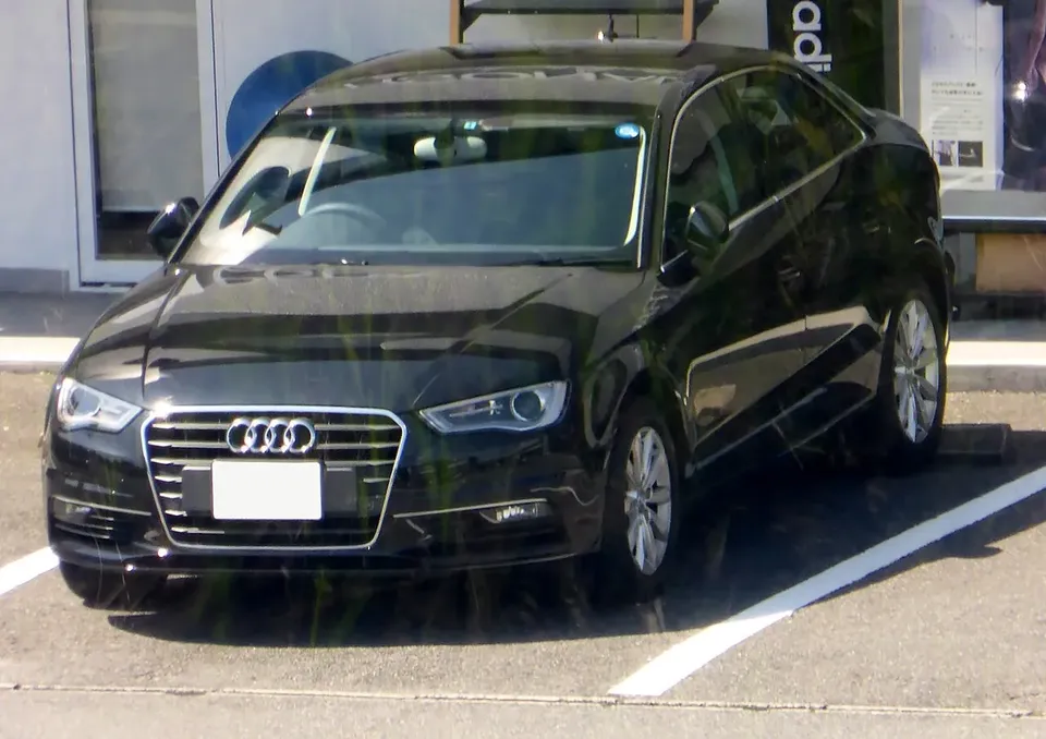 Black Audi A3 Sedan 8V viewed from the front and side