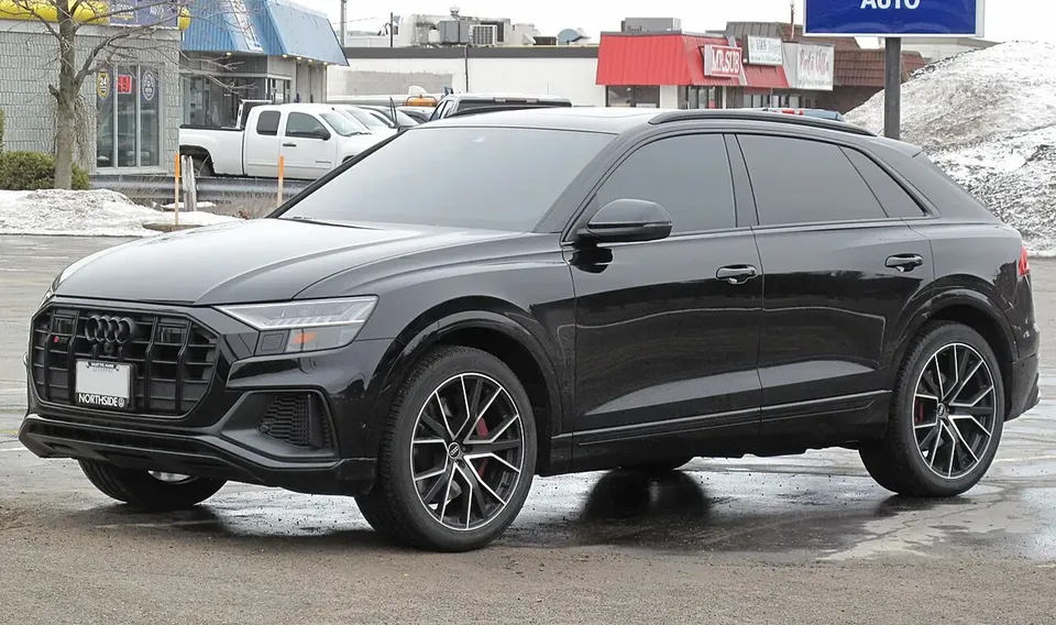 Black 2021 Audi SQ8 TFSI viewed from the front and side