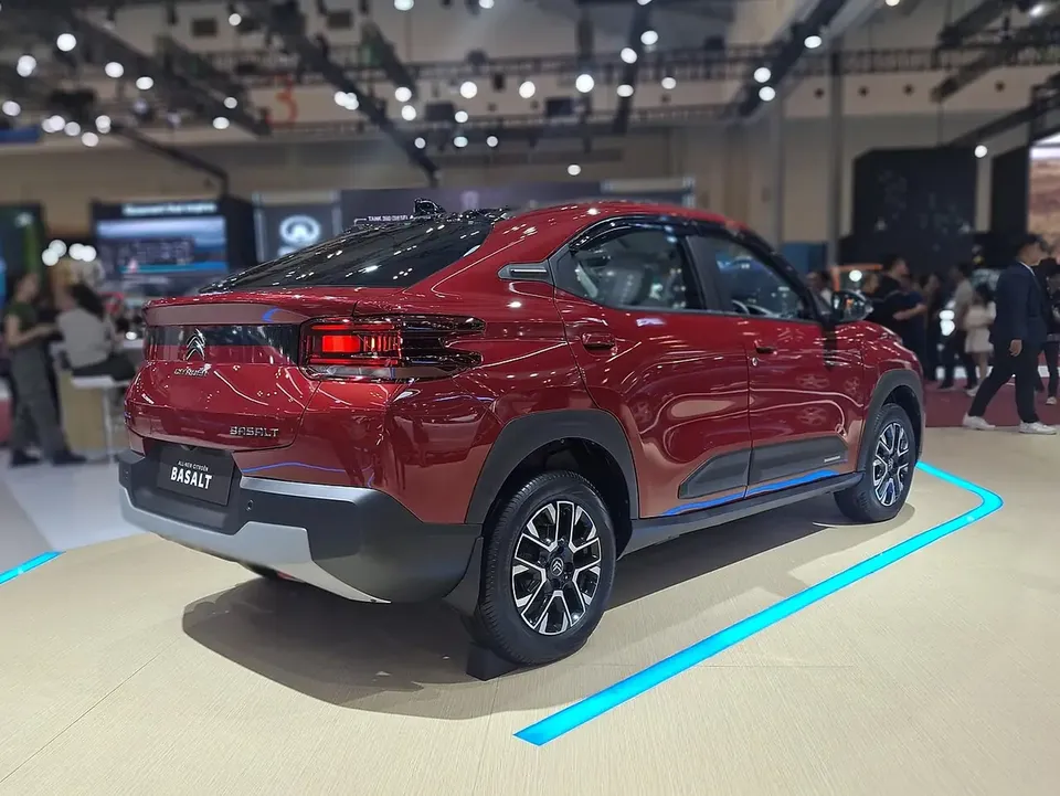 Red Citroën Basalt CC26 photographed from the rear and side at an Indonesian motor show