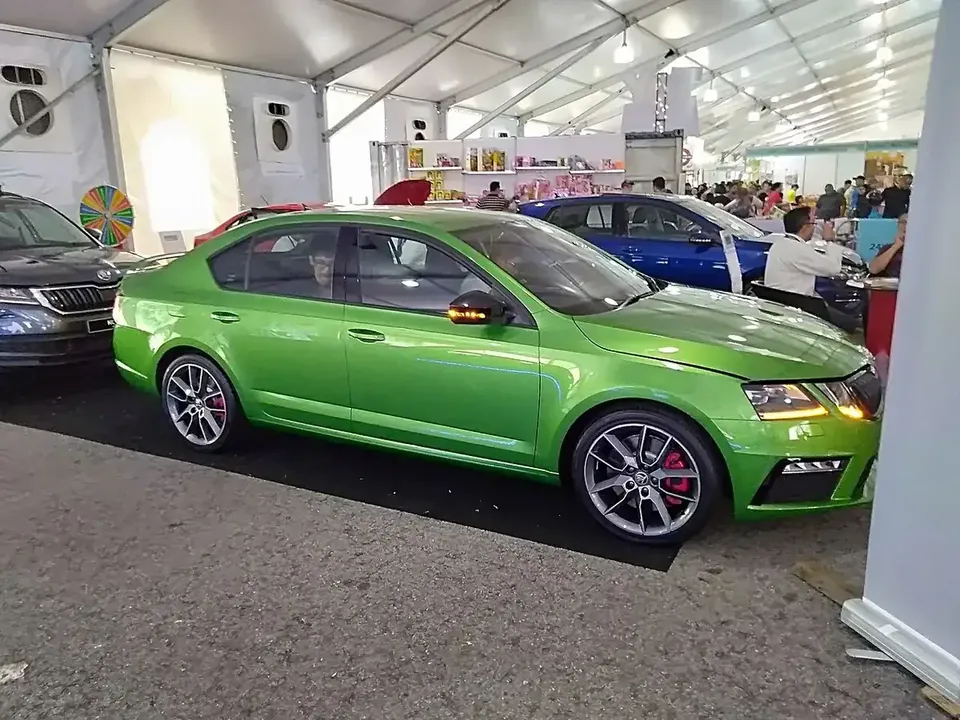 Green third-generation Škoda Octavia RS-245 liftback displayed at a fair in Brunei