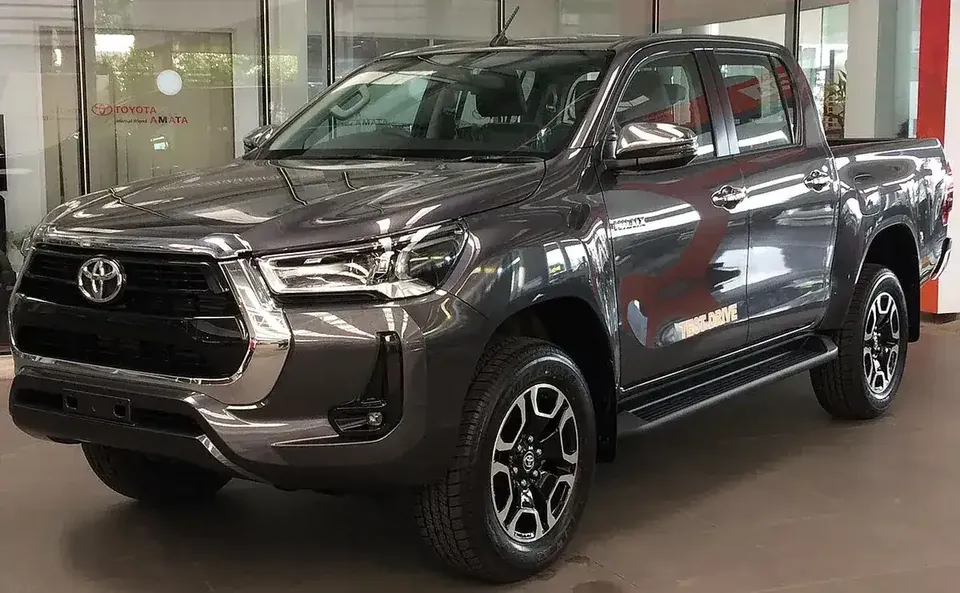 Grey 2021 Toyota Hilux Revo double-cab pickup viewed from the front and side