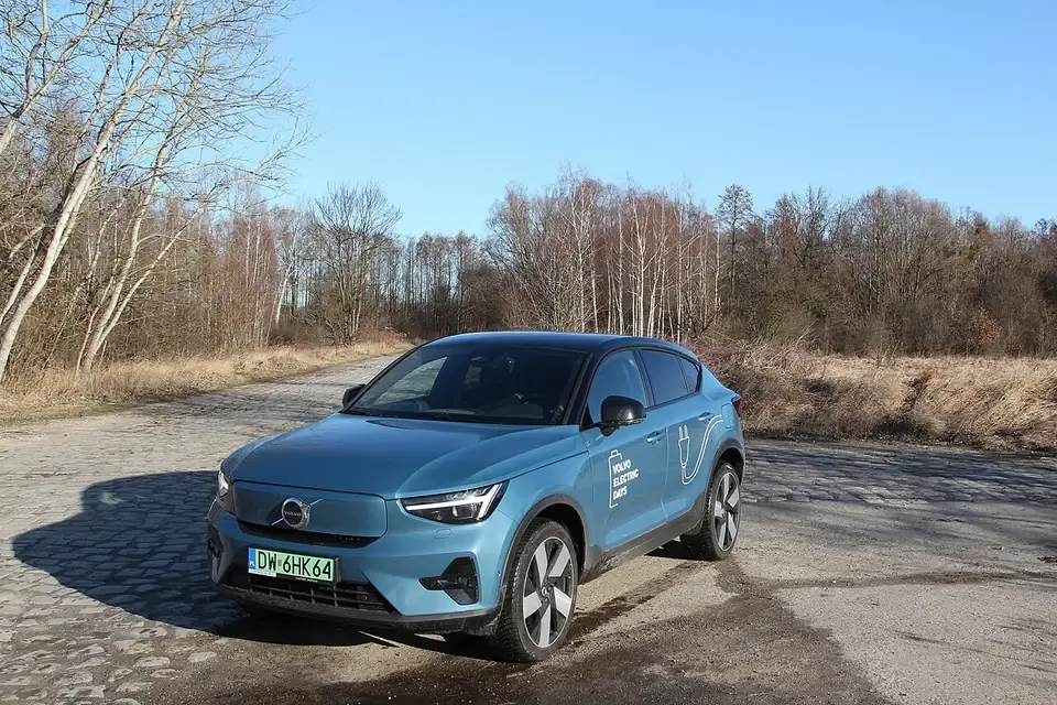 Blue Volvo C40 Recharge electric crossover seen from the front and side