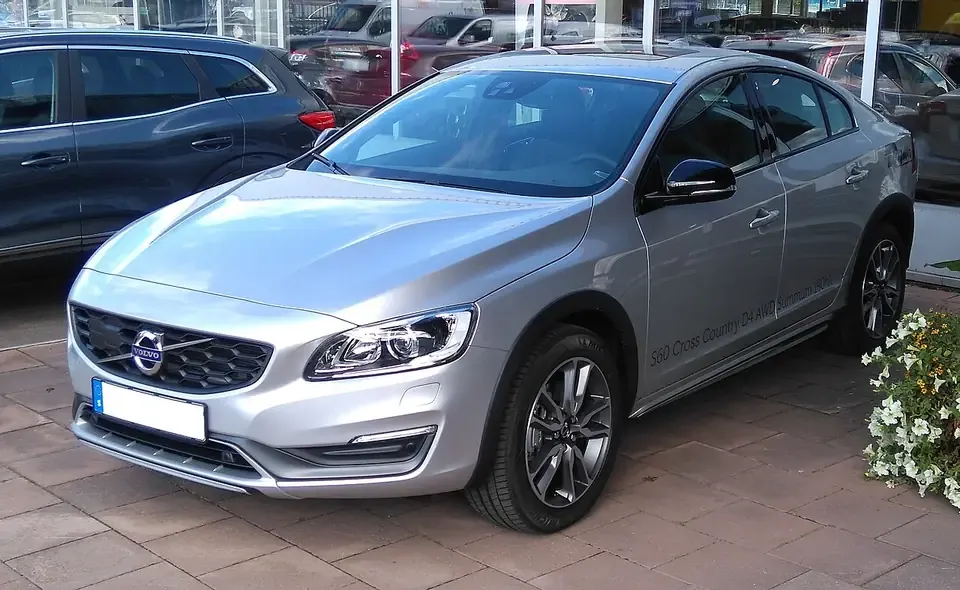 Silver Volvo S60 Cross Country raised sedan seen from the front and side