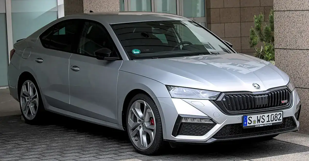 Silver fourth-generation Škoda Octavia RS liftback seen from the front and side