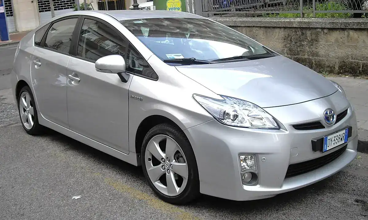 Silver 2010 Toyota Prius XW30 viewed from the front and side