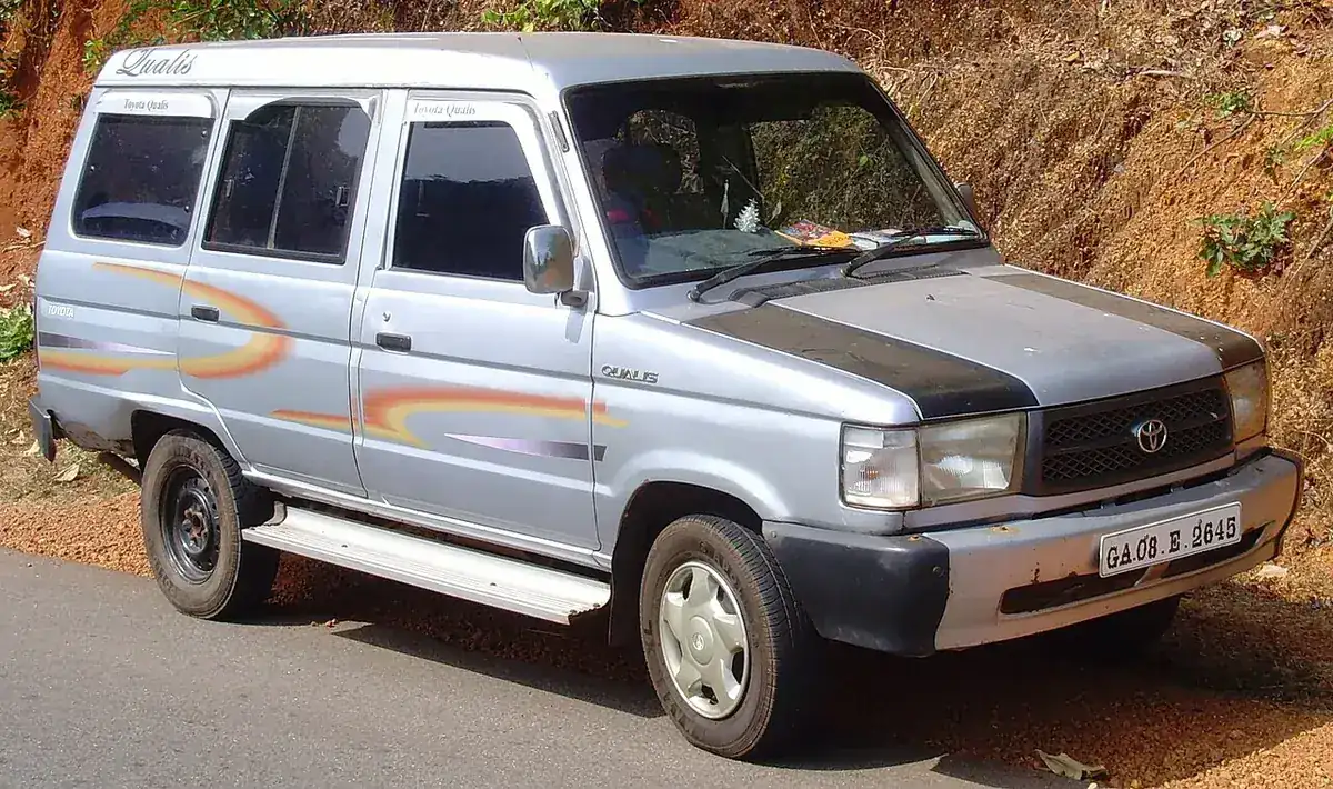 Silver Toyota Qualis viewed from the front and side in Goa