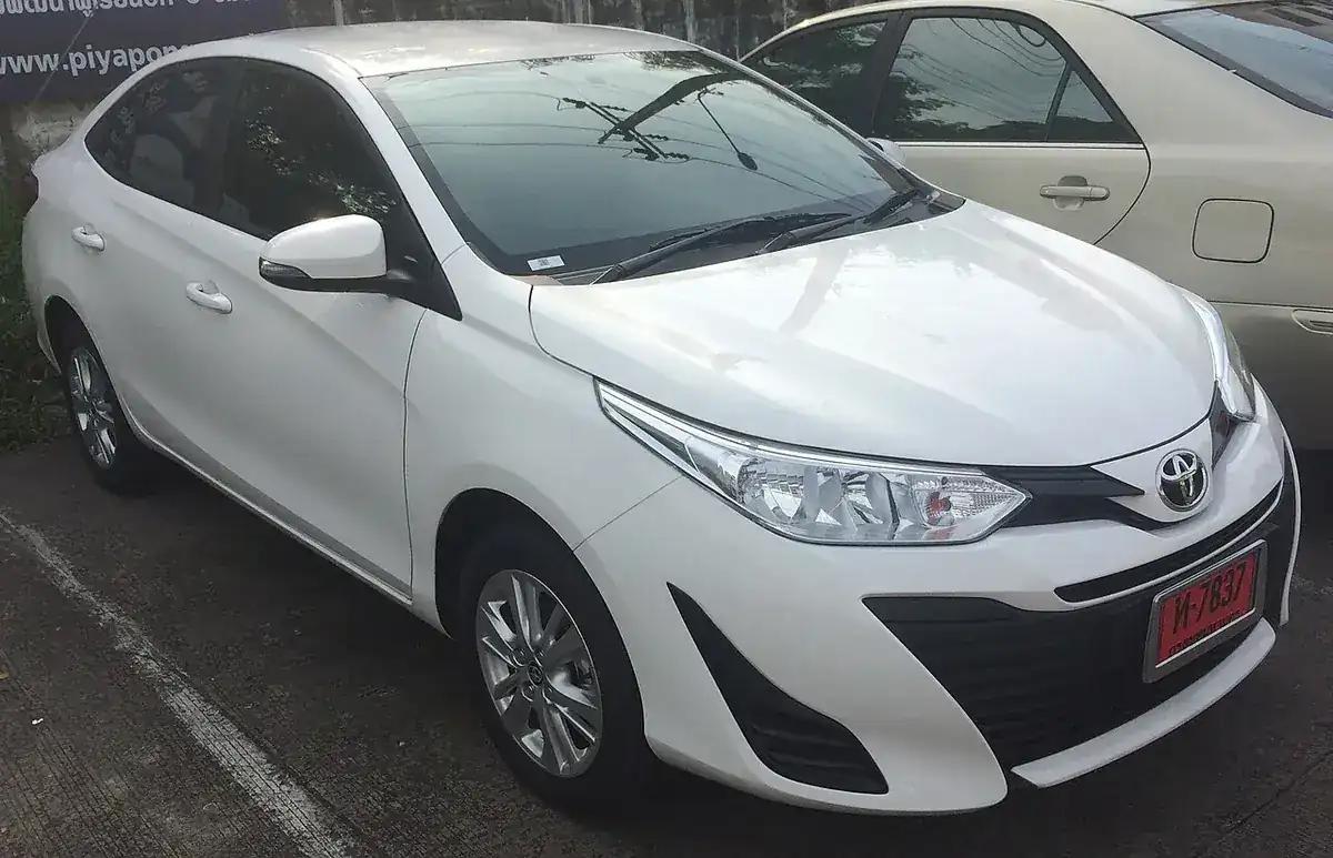 White 2017 Toyota Yaris Ativ XP150 sedan viewed from the front and side
