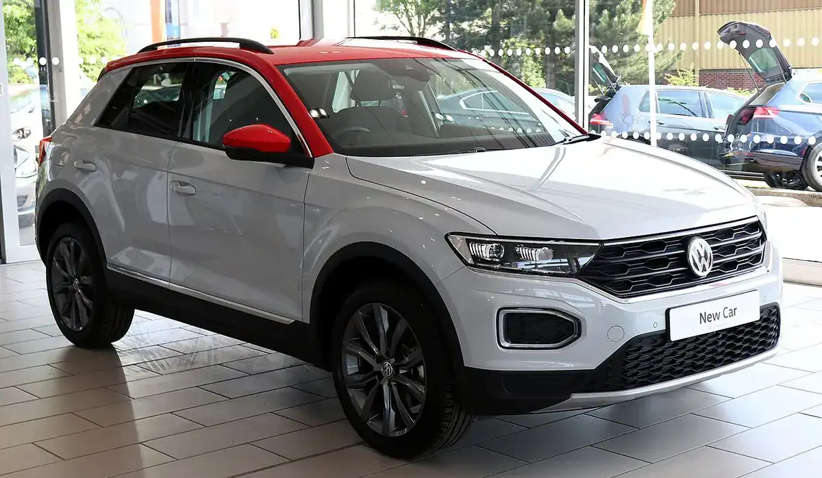 White and red first-generation Volkswagen T-Roc viewed from the front and side