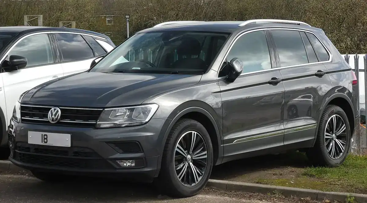 Grey second-generation Volkswagen Tiguan SUV viewed from the front and side