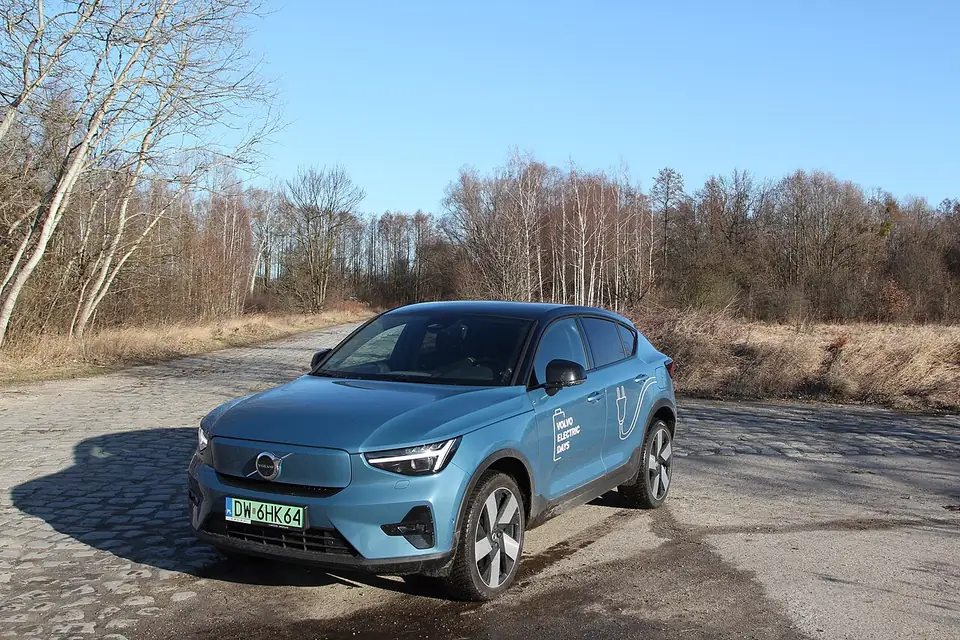 Blue Volvo C40 Recharge electric crossover seen from the front and side